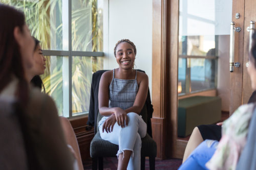 A teenage woman participates in Harford Belair group session.